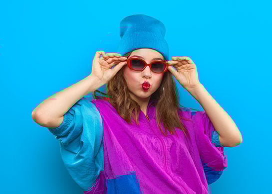 Young woman dressed in 1990's fashion. 