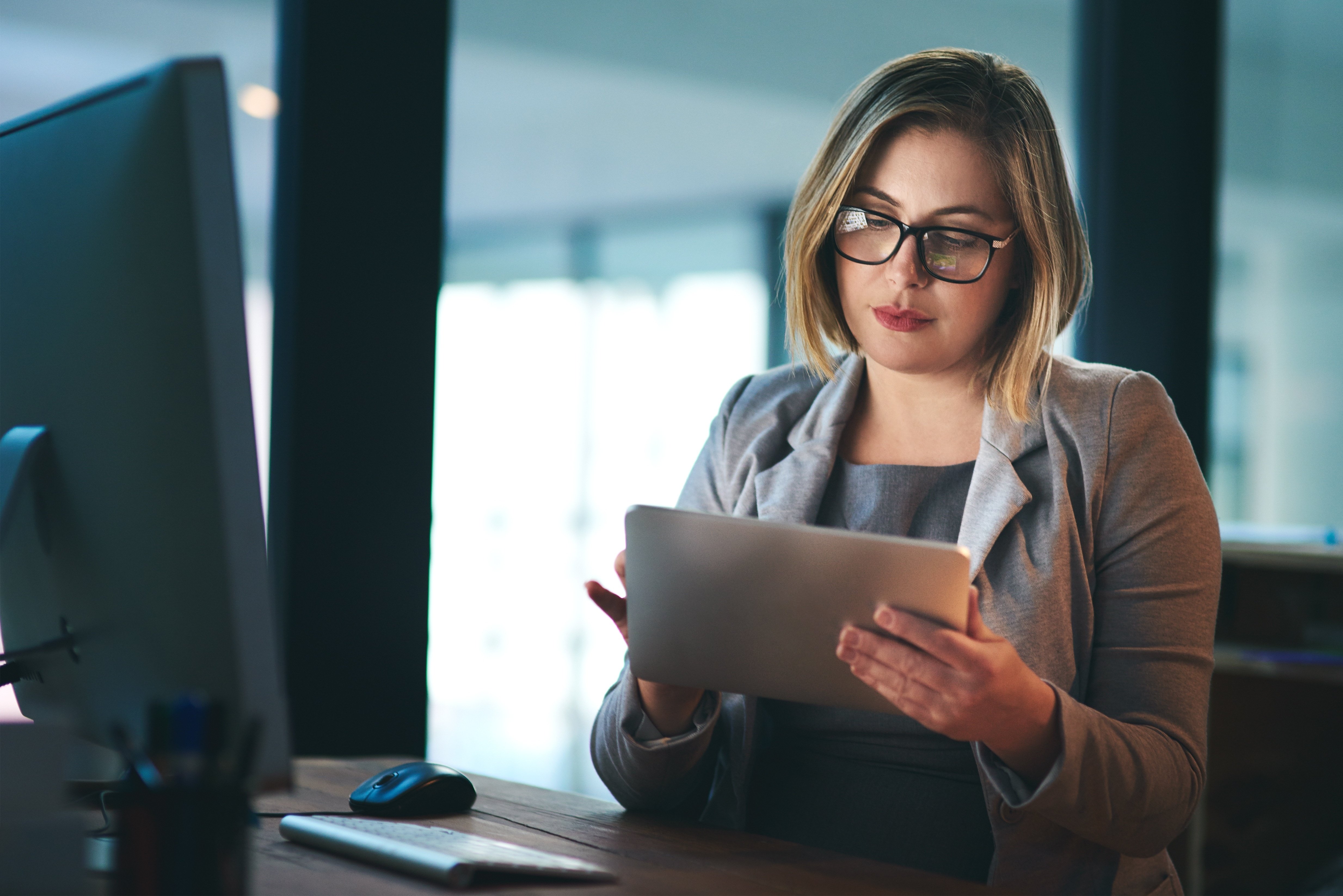 woman learning about fraud trends for banks and credit unions