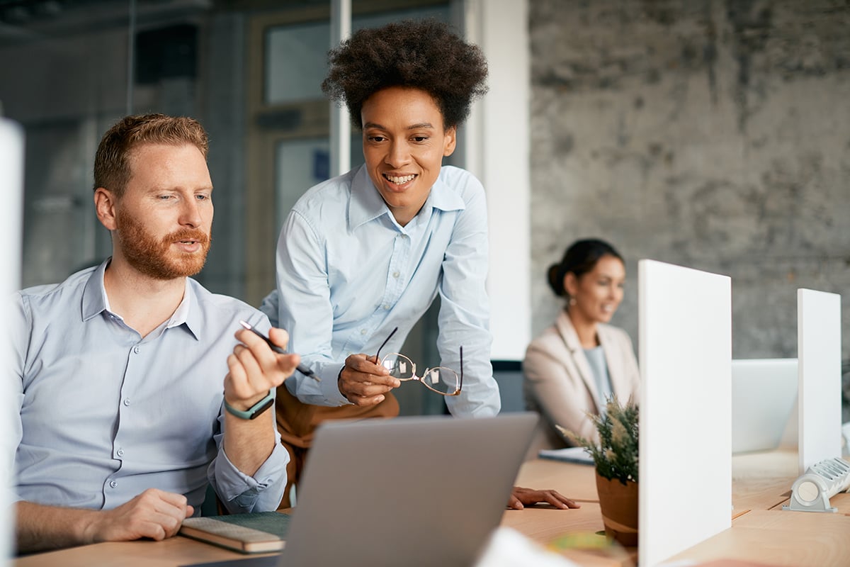 team-learning-about-the-history-of-embedded-payments image