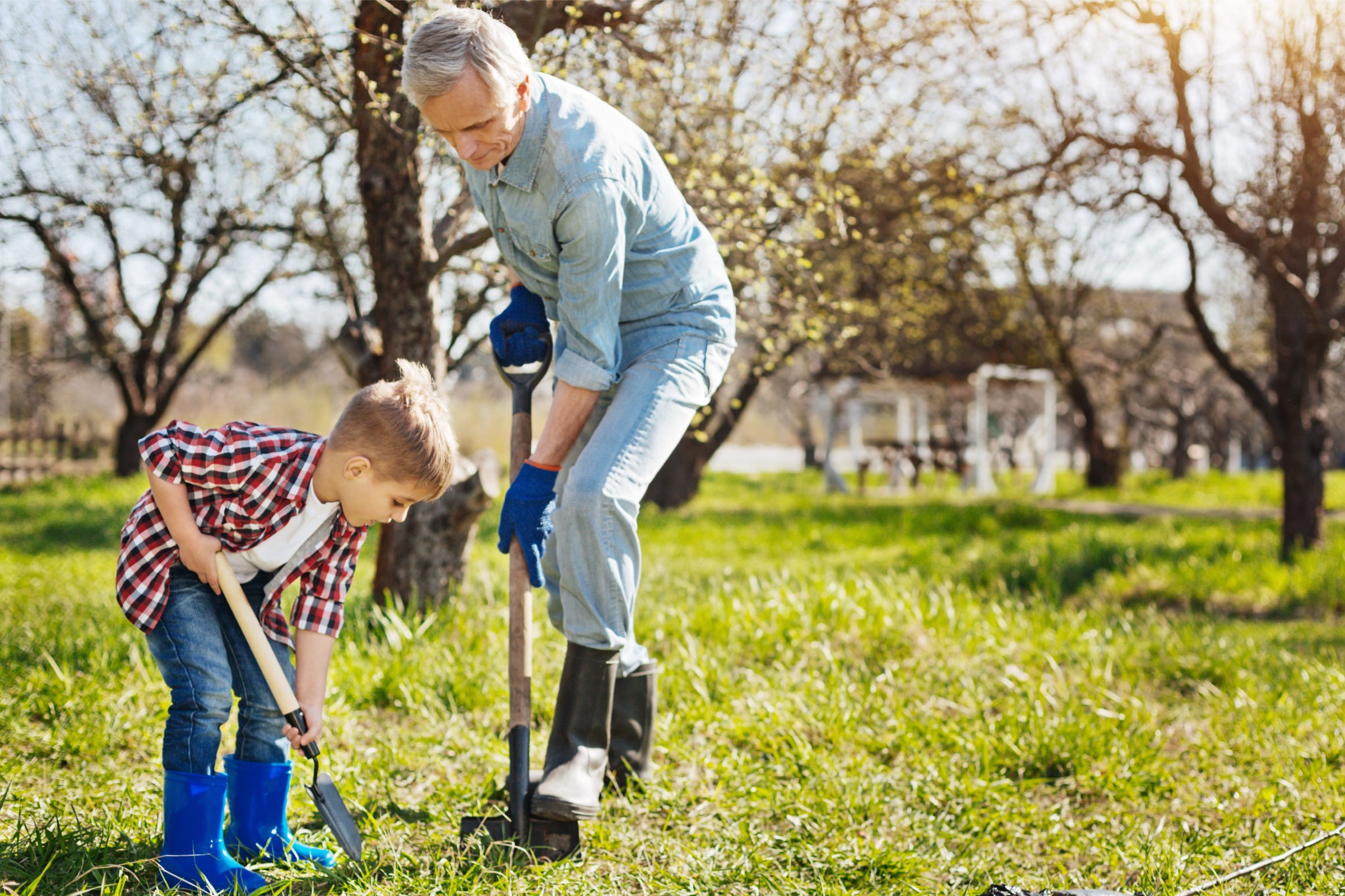 Grandma and grandson in yard