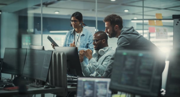 Diverse Group of Professionals Meeting in Modern Office: Brainstorming IT Programmers Use Computer Together
