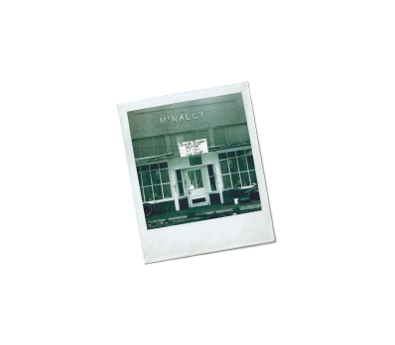 polaroid image of small repair shop