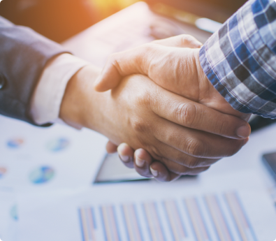 hands of two gentlemen shaking hands