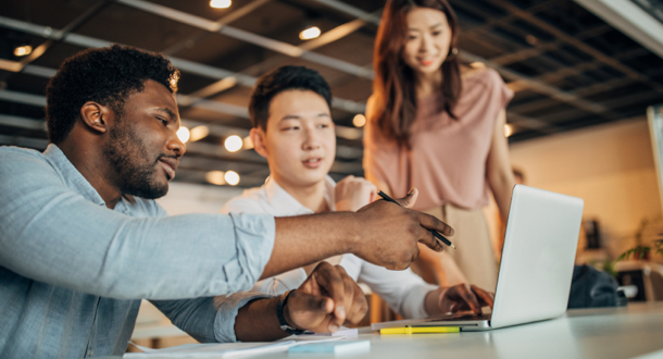 Multi-ethnic group of people, working together in modern firm office