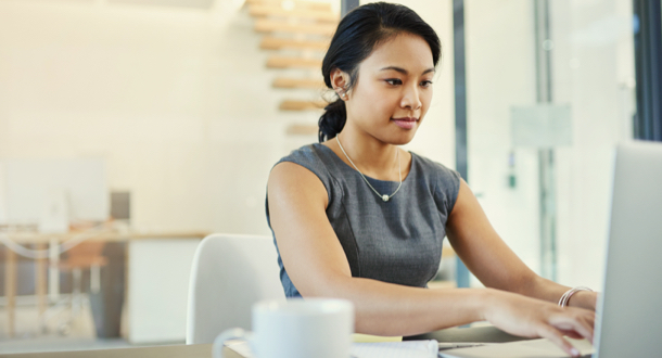 Young businesswoman working on a laptop