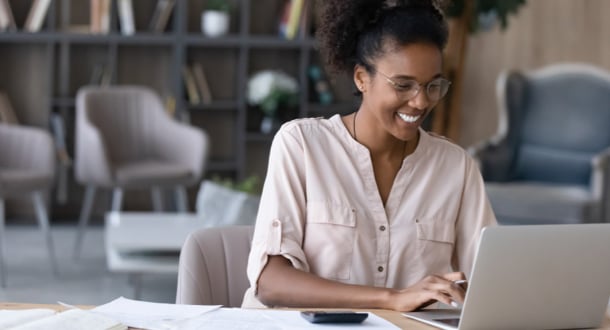 Smiling woman accepting an online payment