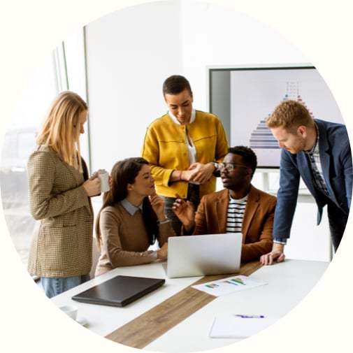 Group of young diverse business people working together in office