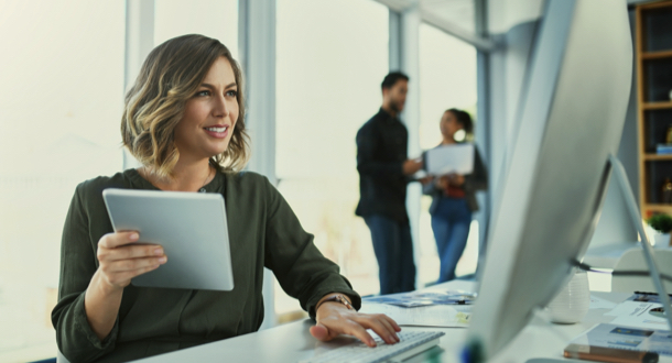 young businesswoman using a digital tablet at work 