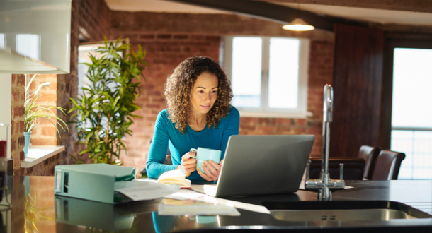 woman working from home in her loft apartment